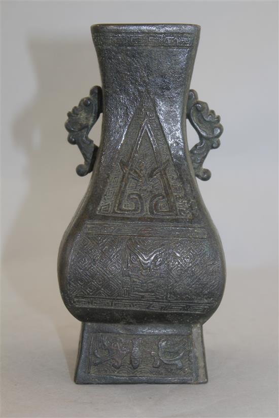 A Chinese square baluster two handled vase, Fanghu, probably Ming dynasty, 18.5cm